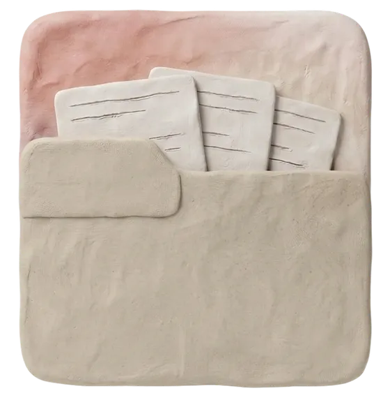 A clay folder holding the project's documents